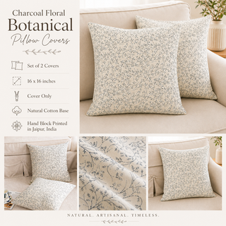 Set of two botanical floral pillow covers in charcoal and cream, shown on a beige sofa with product details and fabric close-ups.