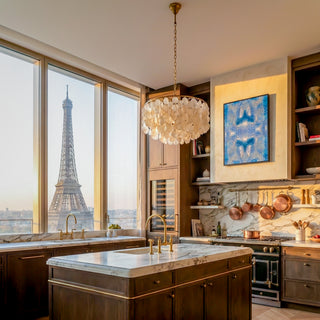 Modern kitchen with Eiffel Tower view through large windows