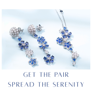 Jewelry set with blue gemstones on a light blue background