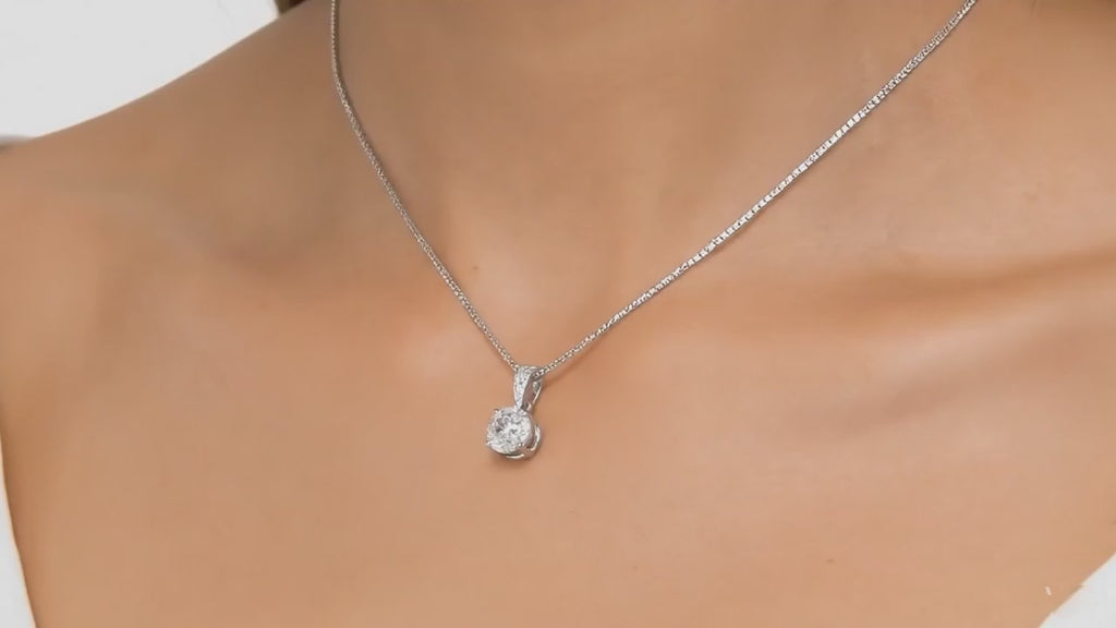 video of woman wearing the 3.35c moissanite pendant
