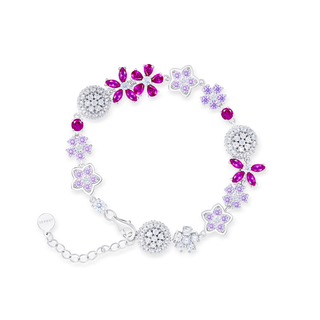 Bracelet with butterfly-shaped pink and purple gemstones on a white background