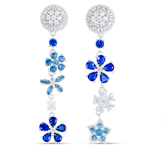 Pair of earrings with blue floral designs and clear stones on a white background