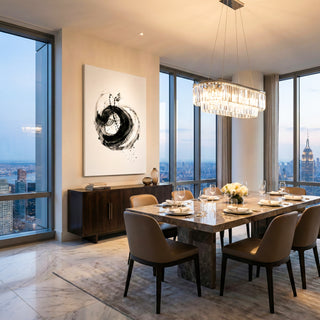 Modern dining room with large windows, marble table, and cityscape view.