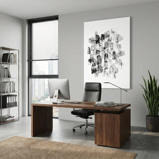 Modern office desk with computer, chair, and decor in a bright room.